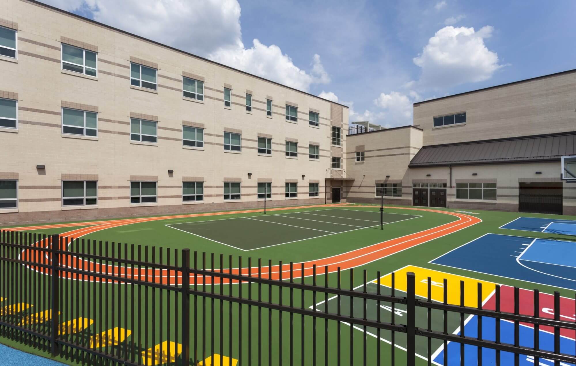 A playground design for a school with very colorful play areas.