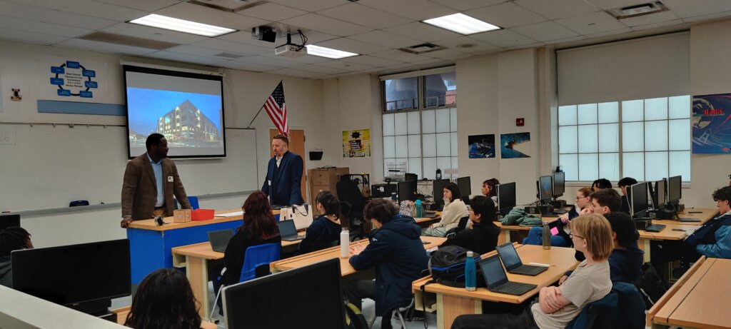SSP Architects Principal Marcus Rosenau and Designer, Jude Saforo talking to West Orange High School students about choosing a career as an architect.